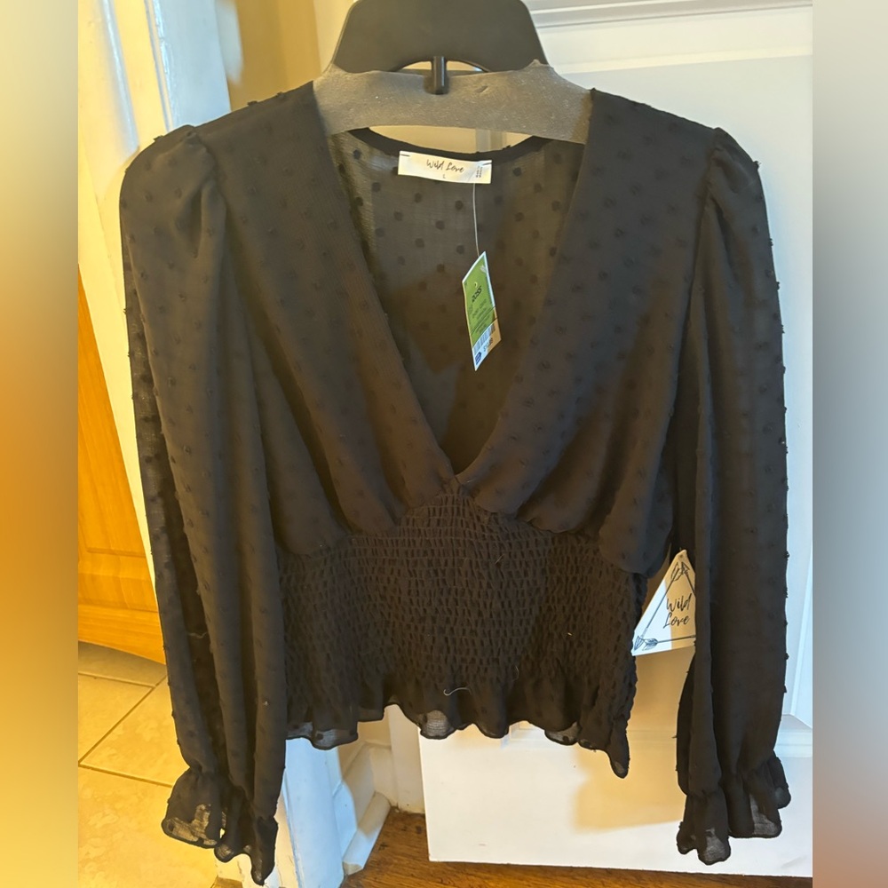 Love sleeve women’s blouse, never worn size large